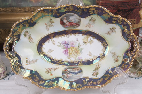 Reinhold Schlegelmilch 공장 (RS 프러시아)오벌 볼 Reinhold Schlegelmilch Factory (RS Prussia) Unmarked Oval Bowl with Florals, Cherubs AND Neo classical Scenes circa 1890